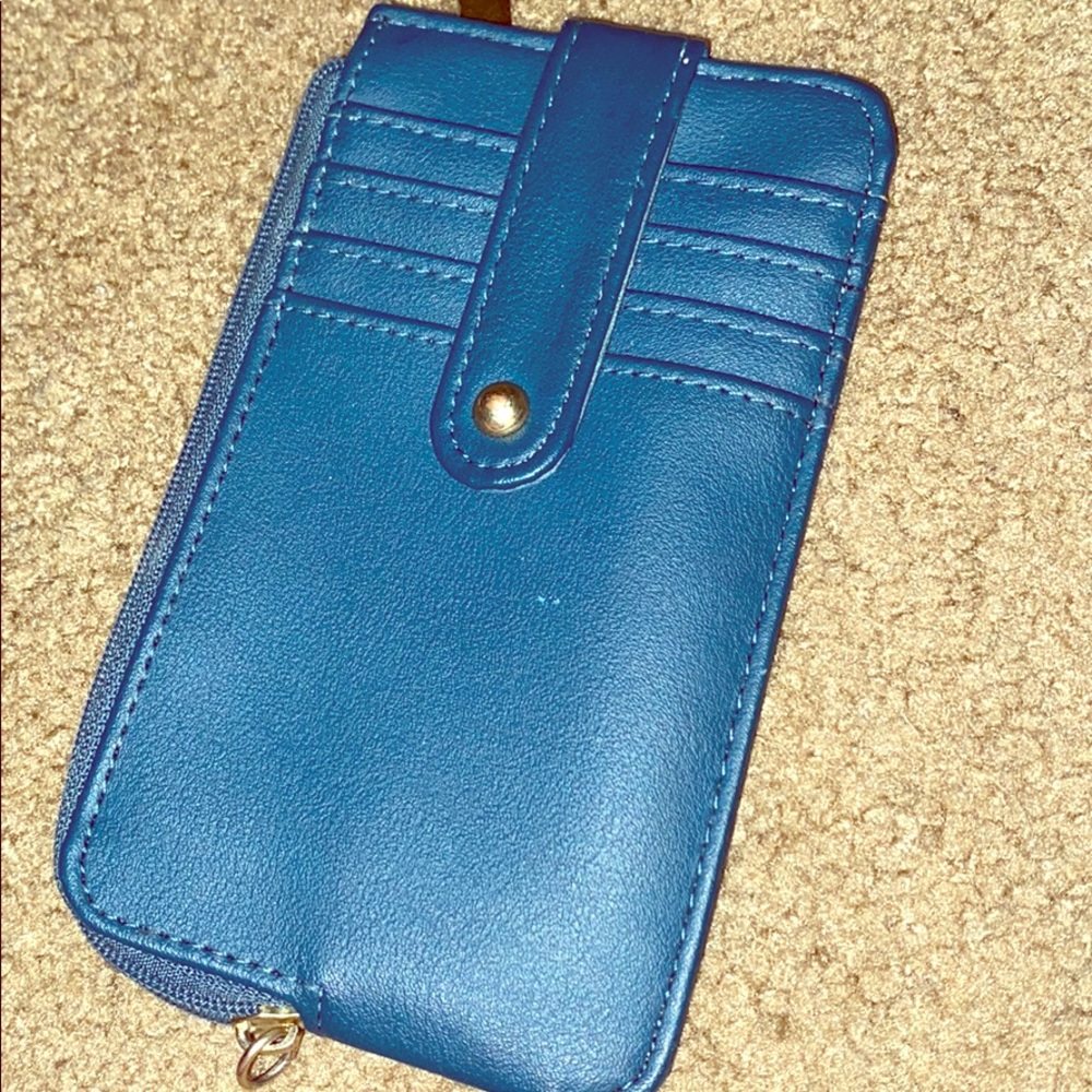 Blue wallet with card holders.